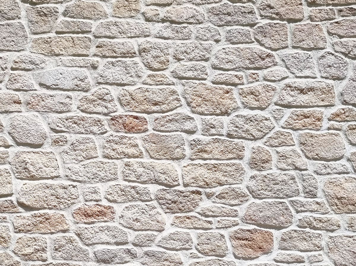 Échantillon de pierre grise et beige clair, effet volcanique